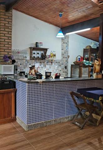 Cozinha compartilhada e churrasqueiras — foto de capa